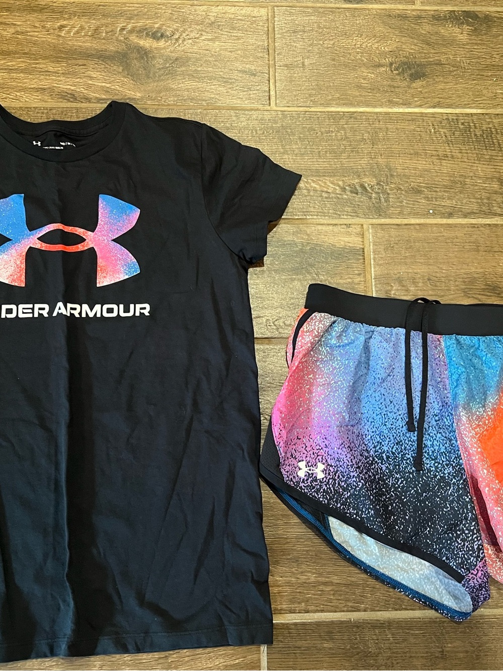 Under Armour women’s size M' Black Tee & Multi-Color Athletic Shorts Set